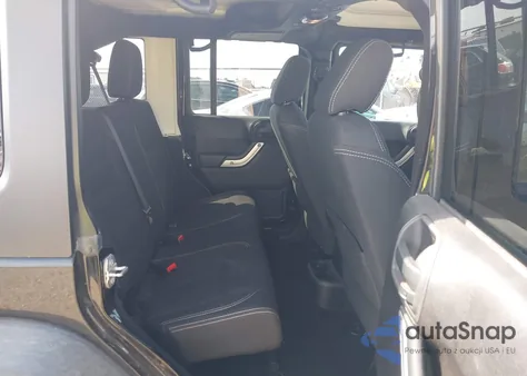 2015 Jeep Wrangler Unlimited Rubicon from USA, damaged, VIN 1C4BJWFGXFL598828